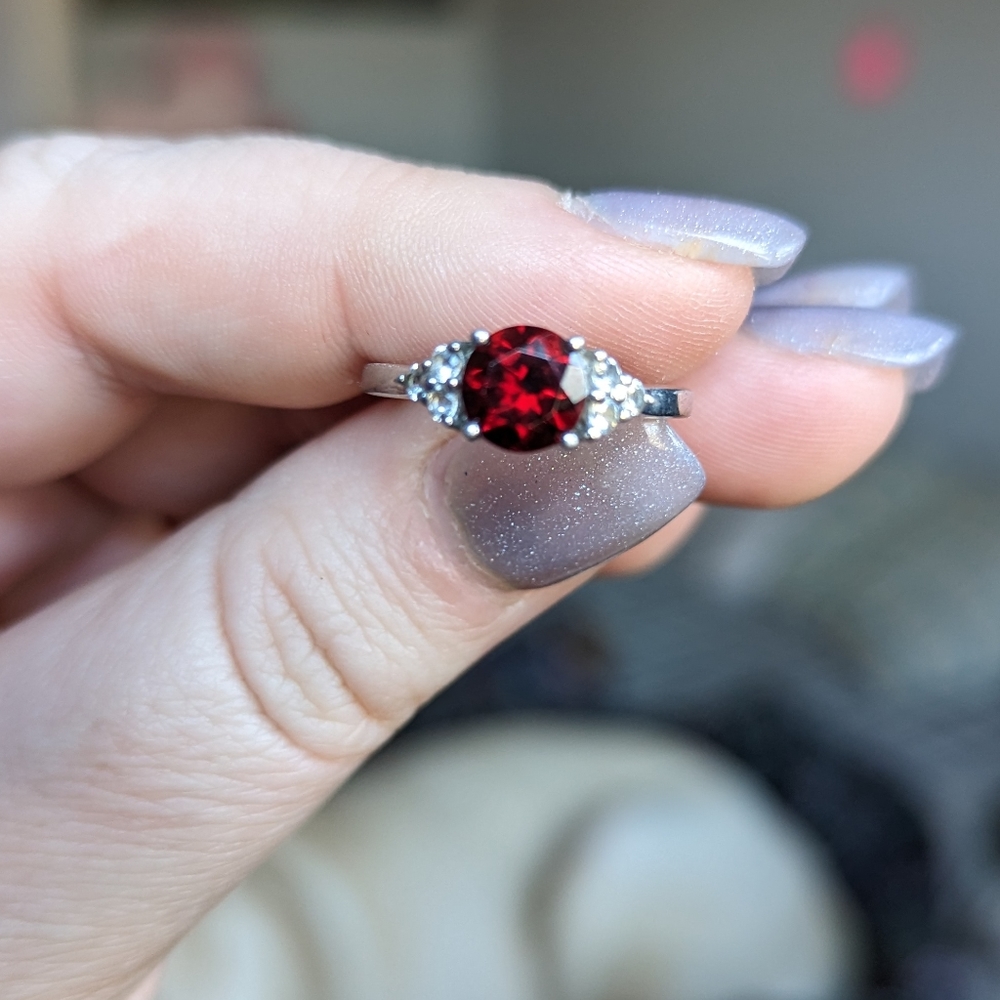 Genuine garnet and white topaz ring set in 925 sterling silver